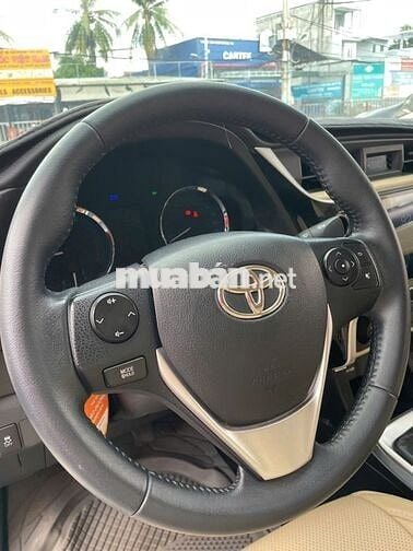 Toyota Corolla Altis 1.8E Trắng 51.000 km Số sàn