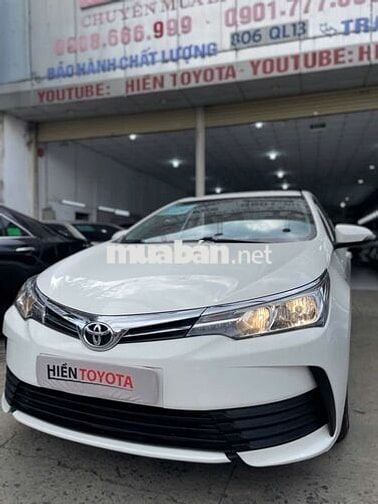 Toyota Corolla Altis 1.8E Trắng 51.000 km Số sàn