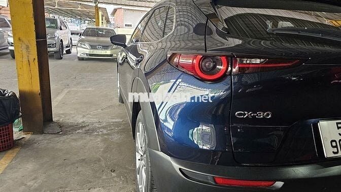Mazda CX-30 Deluxe 2023 15.200 km Đen