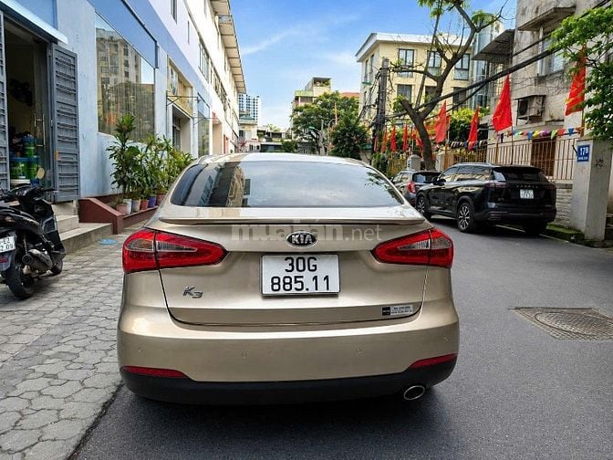 Chính chủ Cần bán xe kia k3 AT 1.6 màu vàng cát biển Hà Nội