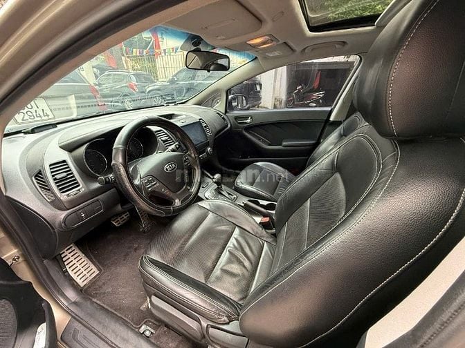 Chính chủ Cần bán xe kia k3 AT 1.6 màu vàng cát biển Hà Nội