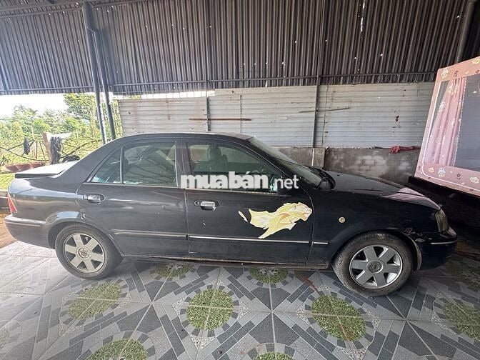 Ford Laser 2003 Đen 5 chỗ
