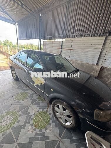 Ford Laser 2003 Đen 5 chỗ