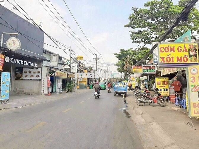 Nhà Mặt Tiền Lý Phục Man Quận 7 - ngang 12 , dài 38  cho xây cao tầng