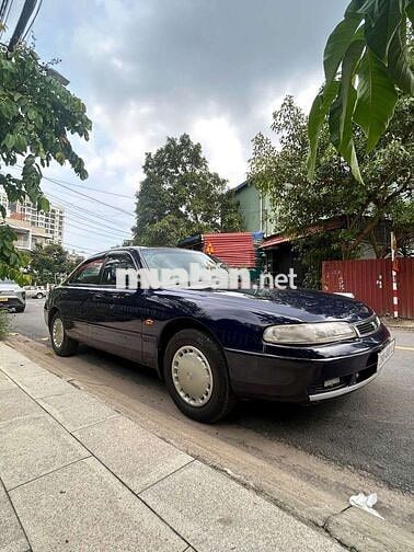 Cần bán Mazda 626 đời 1995, màu xanh đậm