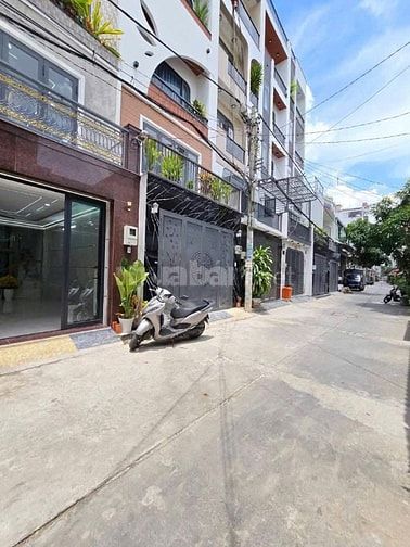 Nhà 4.5 tấm 4,5x14 thang máy 450kg HƯƠNG LỘ 2