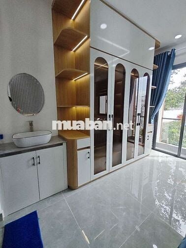 Nhà gần CVPM Quang Trung, 4mx13m, 1 trệt 1 lửng 3 lầu có gara xe hơi