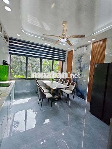 Nhà gần CVPM Quang Trung, 4mx13m, 1 trệt 1 lửng 3 lầu có gara xe hơi
