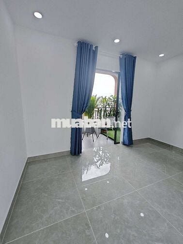 Nhà gần CVPM Quang Trung, 4mx13m, 1 trệt 1 lửng 3 lầu có gara xe hơi