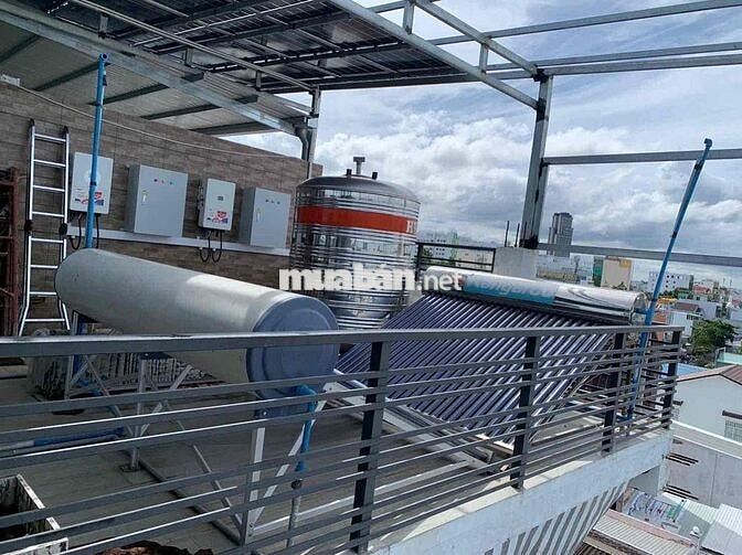 Khối nhà 1 trệt 2 lầu + sân thượng 1100m2