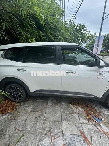 Kia Carens 2010 Trắng 7 chỗ số tự động