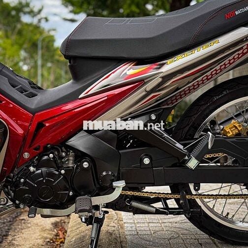 Exciter ct 55p1 xuống áo bạc bánh căm