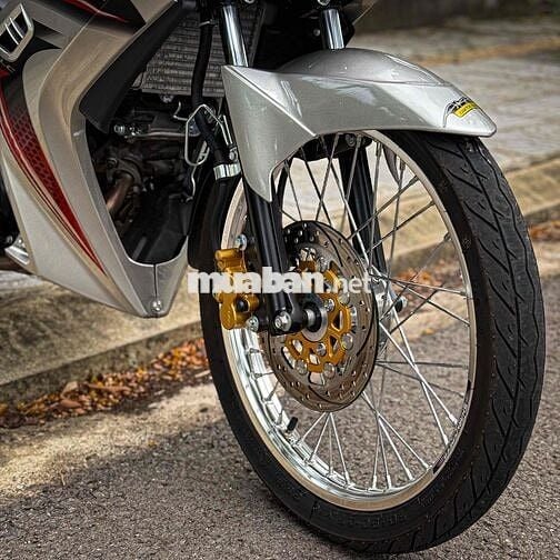 Exciter ct 55p1 xuống áo bạc bánh căm