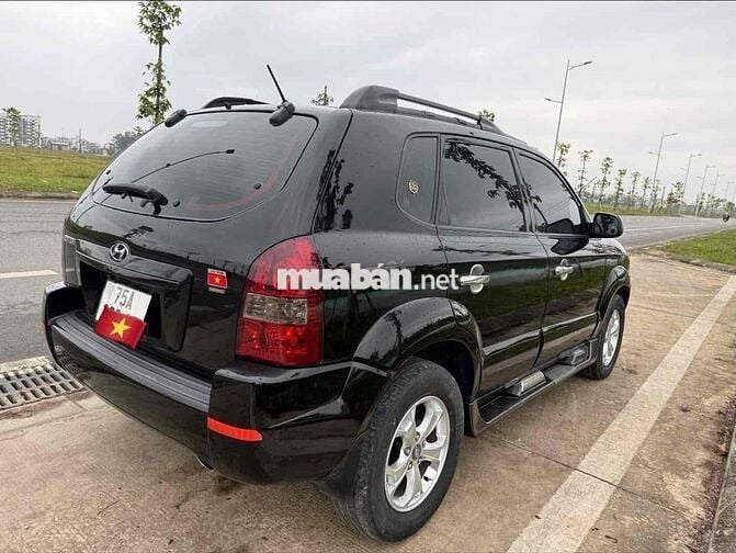 Hyundai Tucson 2009 Đen Tự động 152.888km