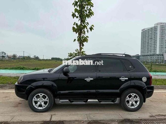 Hyundai Tucson 2009 Đen Tự động 152.888km