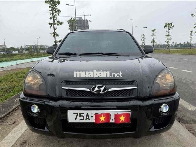 Hyundai Tucson 2009 Đen Tự động 152.888km