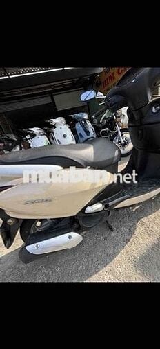 Honda Vision Vàng kem