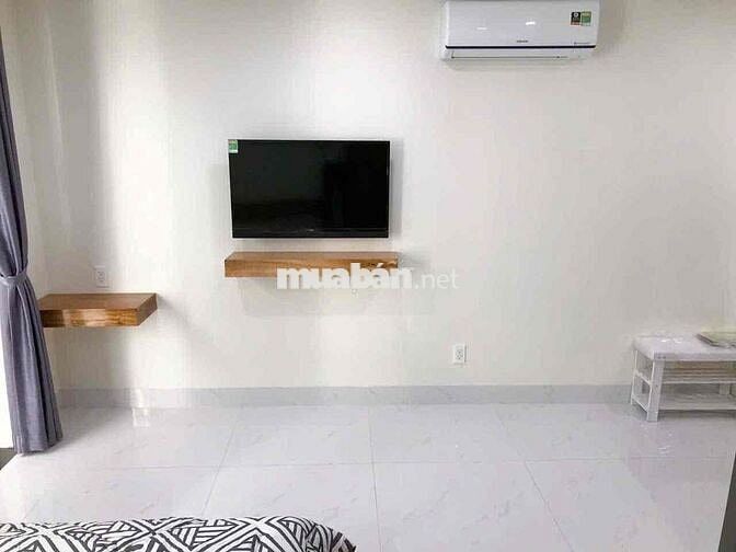 Cho thuê studio trệt ban công thang máy giặt full nt Trần Hưng Đạo Q1