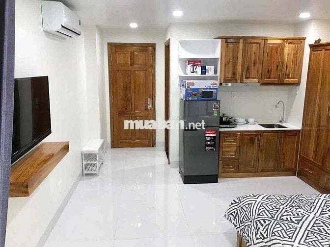 Cho thuê studio trệt ban công thang máy giặt full nt Trần Hưng Đạo Q1