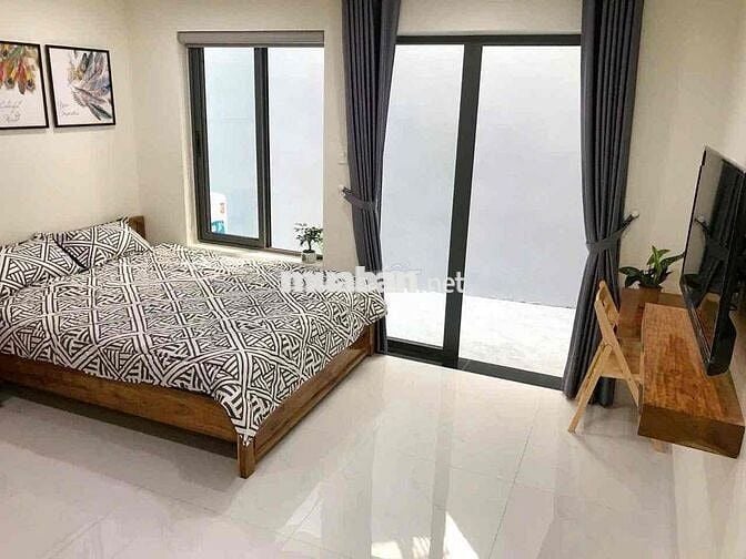 Cho thuê studio trệt ban công thang máy giặt full nt Trần Hưng Đạo Q1
