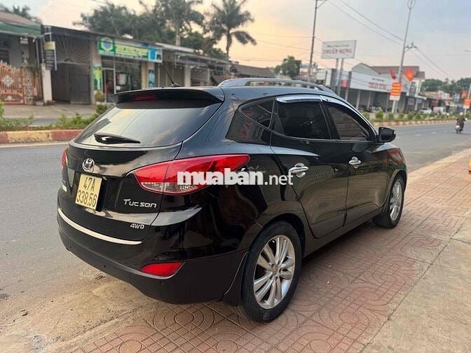 Hyundai Tucson 2011 Tự động Xăng Đen 2.0
