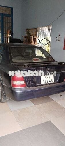 Mazda 323 Số sàn Xanh đen