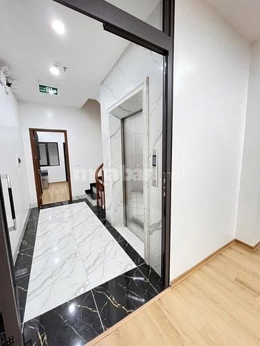 Bán nhà Mai Anh Tuấn, Hoàng Cầu 75m, 7 tầng, có thang máy, ô tô tránh