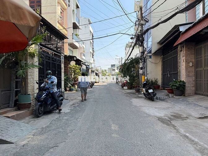 Nhà Nguyên căn Trệt lửng 4 Lầu Có 5PN CÓ Thang máy 450ky Hẻm 8m 1 trục