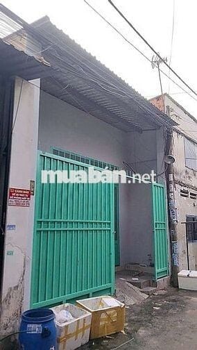 Nhà SHR Cấp 4. Sát truong Nguyễn Hữu Tiến.DT 45m..hẻm xe hoi .2ph ngủ