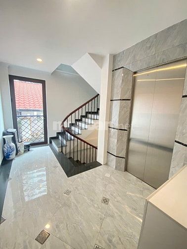 Bán nhà PLQĐ Phùng Chí Kiên Cầu Giấy 52m2x7T oto vào nhà, giá 20.68 tỷ
