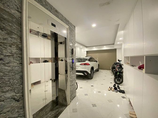 Bán nhà PLQĐ Phùng Chí Kiên Cầu Giấy 52m2x7T oto vào nhà, giá 20.68 tỷ