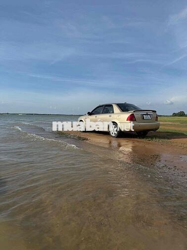 Ford Laser 2003 Vàng cát Sàn