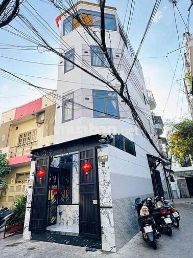 nhà góc 2 mặt tiền hẻm xe hơi đậu trước cửa , ngay chợ gò Vấp