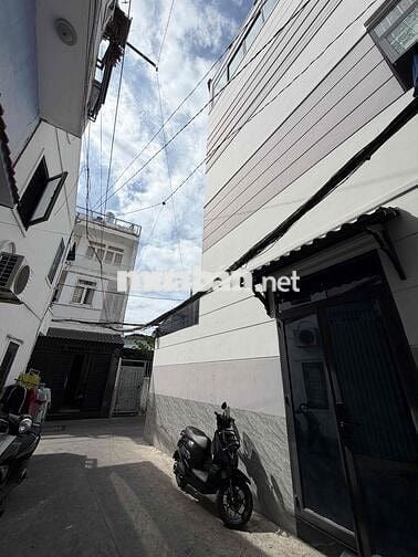 nhà góc 2 mặt tiền hẻm xe hơi đậu trước cửa , ngay chợ gò Vấp