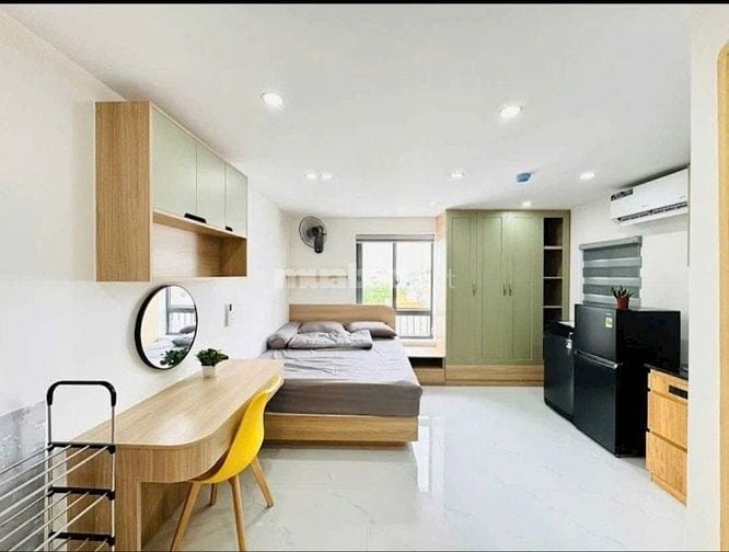 Toà nhà 4 Lầu THANG MÁY CAO CẤP 2 Mặt tiền hẻm xe hơi 7m Lê Quang Định