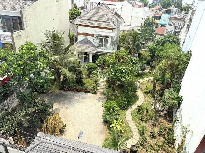 Toà nhà 4 Lầu THANG MÁY CAO CẤP 2 Mặt tiền hẻm xe hơi 7m Lê Quang Định