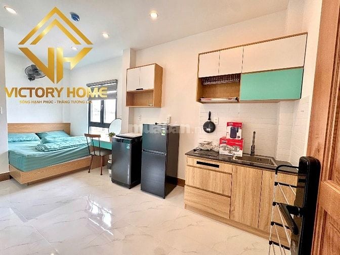 Toà nhà 4 Lầu THANG MÁY CAO CẤP 2 Mặt tiền hẻm xe hơi 7m Lê Quang Định