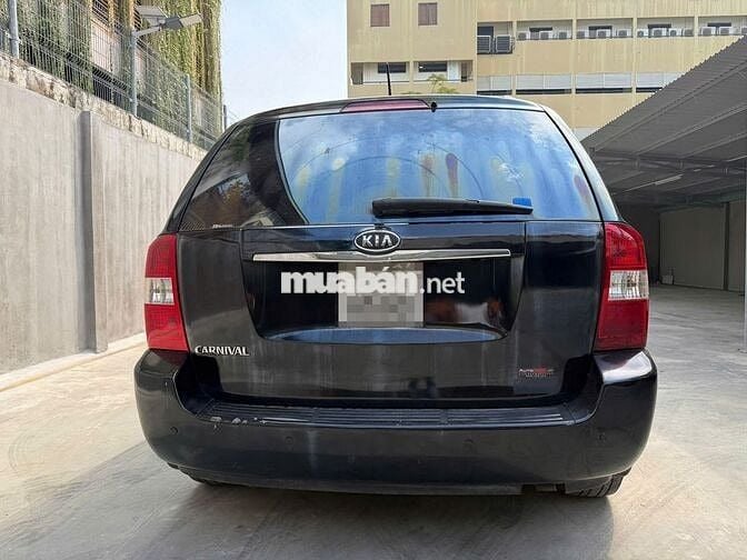 Kia Carnival MT 2009 8 chỗ Đen