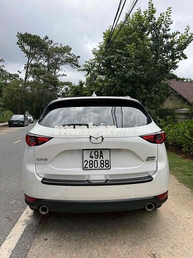 Mazda CX-5 2.0 Deluxe 2019 Trắng 66.000 km