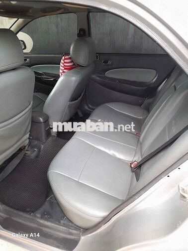 Mazda 323 2000 Xám bạc