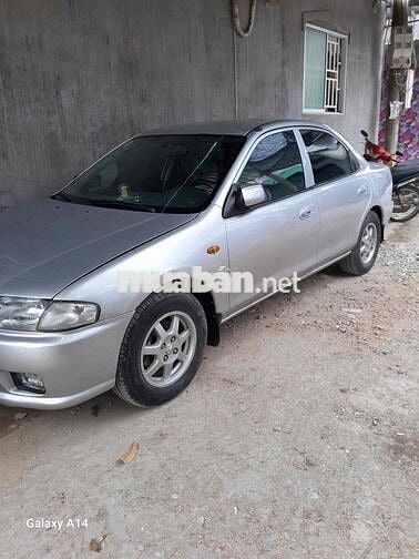 Mazda 323 2000 Xám bạc