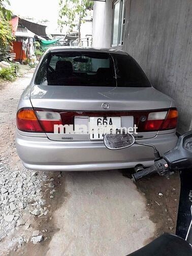 Mazda 323 2000 Xám bạc