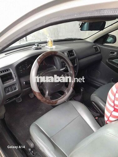 Mazda 323 2000 Xám bạc
