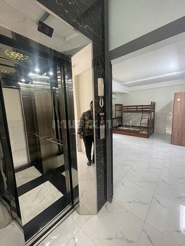 Bán nhà có THANG MÁY làm CHDV góc 2 mặt hẻm xe hơi 5m khu VIP Nguyễn V
