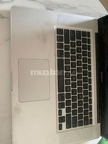 Thanh lý xác Macbook Pro nguyên khối, ngoại hình còn đẹp, cấn 1 góc.