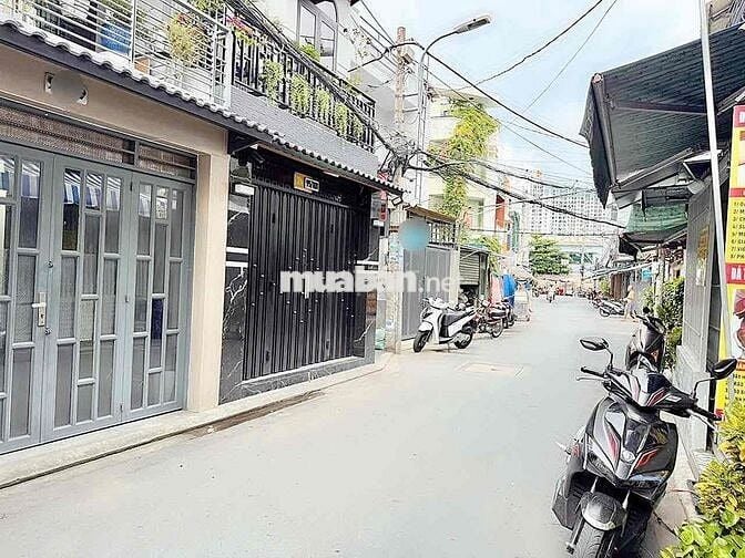 NHÀ MẶT TIỀN XE HƠI - KINH DOANH BUÔN BÁN ĐƯỢC .