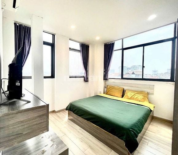 Bán CHDV MT Giải Phóng gần Sân Bay dt 7,5x30 nhà 6 tầng HDT 210tr/th