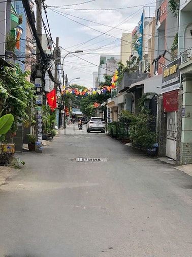 Bán nhà đẹp 6 lầu hẻm 535 Thống Nhất 100m2 T.máy gần trường C2 12.8 tỷ
