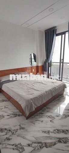 Cần Bán Gầp nhà Đường TTN2 Hẻm xe hơi DT 4,2 x13,5 1 trệt 1Lửng 3 Lầu