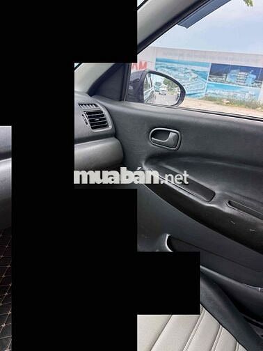 Mazda 323 2000 Đen